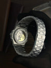 Close-up of luxury men's automatic watch back with stainless steel band, Ministry of Mens Affair